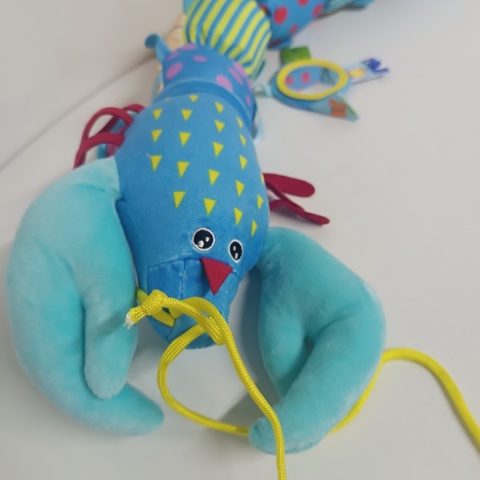 Zabawka sensoryczna dla dzieci, pluszowa, antystresowa, grająca, kolorowy krab