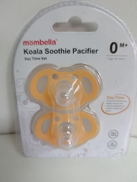 Mombella Smoczek uspokajający Koala 0-6 m pomarańczowy, 2 szt zestaw