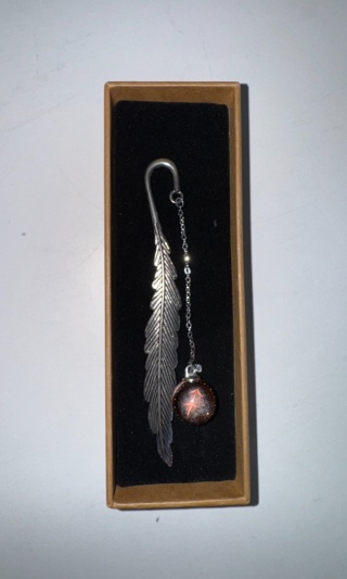 Metalowa zakładka do książki – pióro z zawieszką gwiezdną