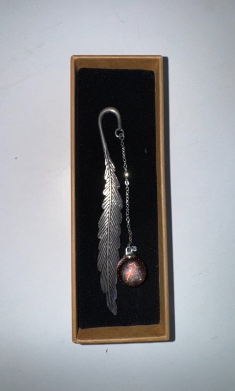 Metalowa zakładka do książki – pióro z zawieszką gwiezdną