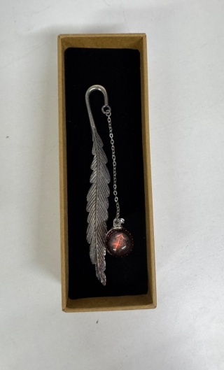 Metalowa zakładka do książki – pióro z zawieszką gwiezdną